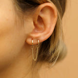 Model wears Dangly Cuban Chain Earring Charm in 14k solid gold gift for her