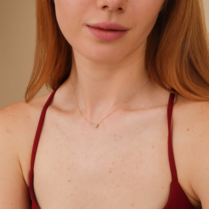 dainty solid gold necklace with paved diamond disc pendant 