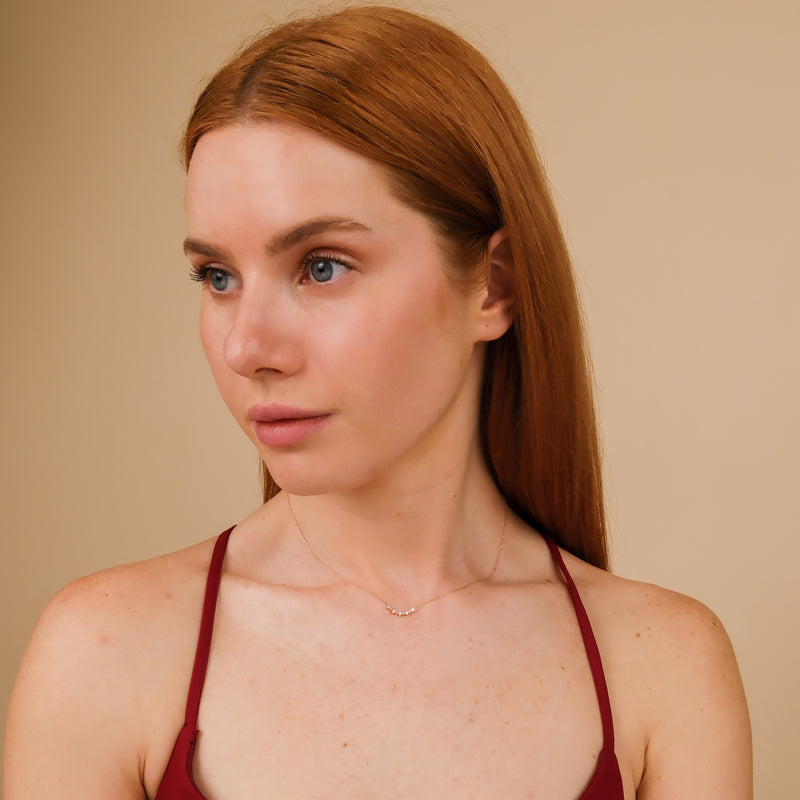 solid gold minimalistic natural diamond cluster curved bar necklace