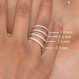 white diamond half eternity rings in different sizes and thickness