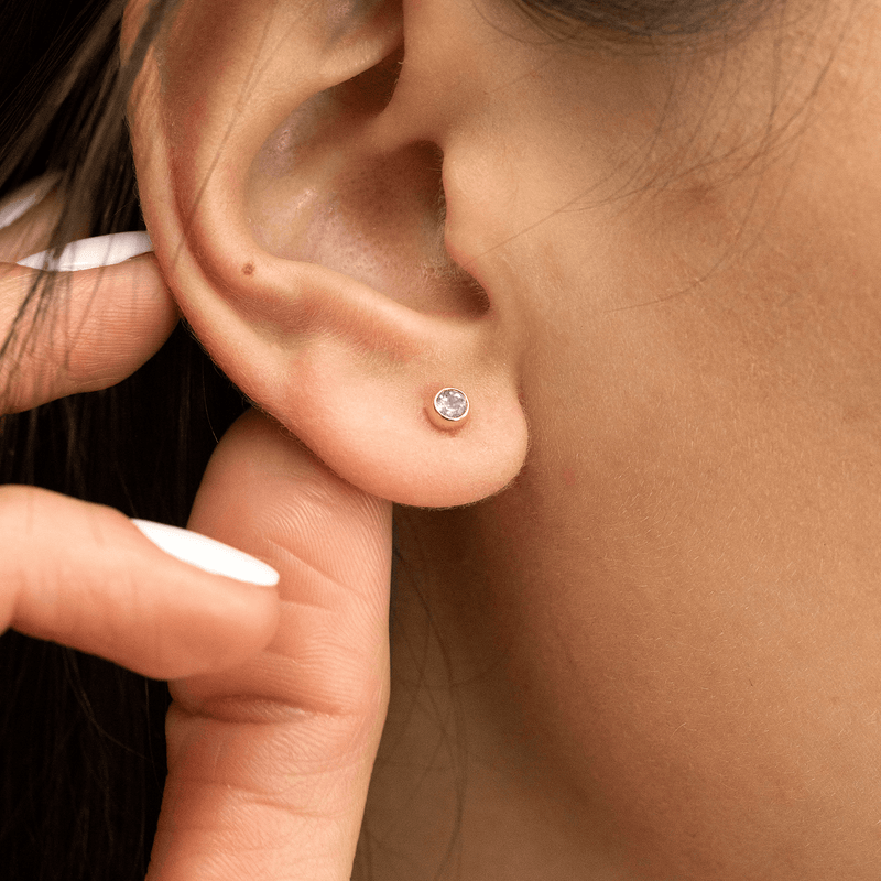 petite february birthstone earrings