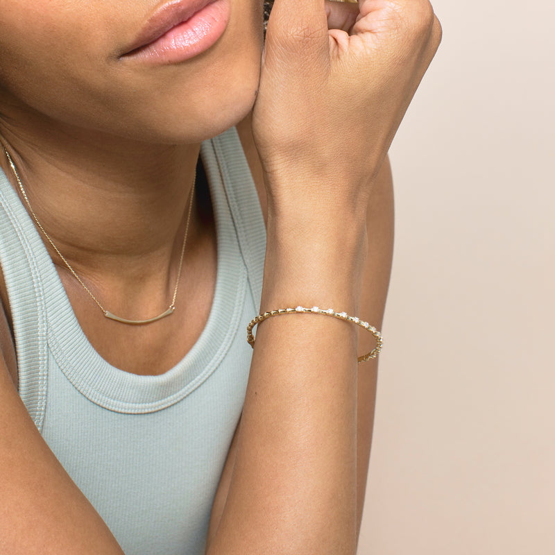 natural diamond and solid gold ribbed  bangle