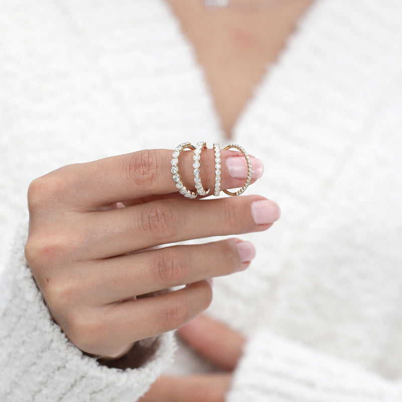 Diamond bezel half eternity ring