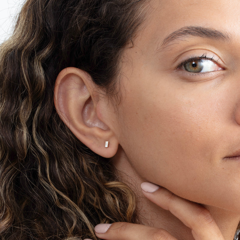 handcrafted in solid gold minimalist diamond studs