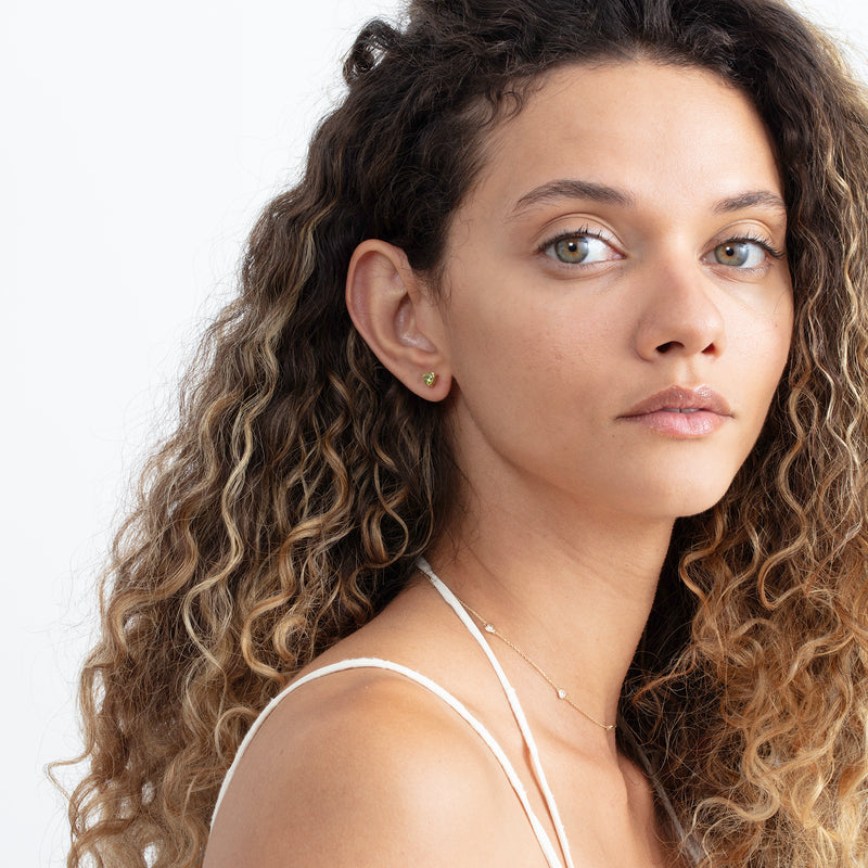 14k trilliant cut peridot stud