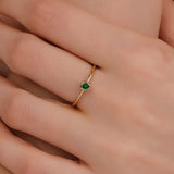 bezel set emerald ring