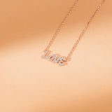 april birthstone love pendant with paved diamonds in solid gold