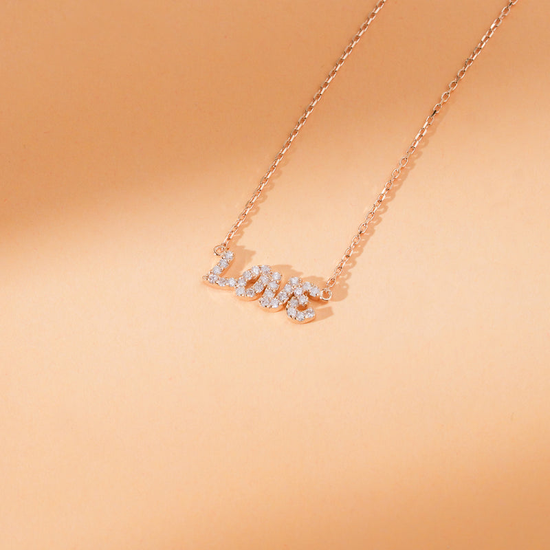 april birthstone love pendant with paved diamonds in solid gold