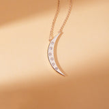 handmade solid gold crescent moon pendant necklace with natural white diamonds