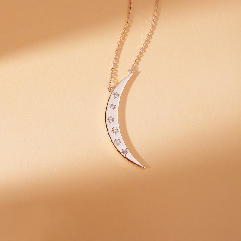 handmade solid gold crescent moon pendant necklace with natural white diamonds