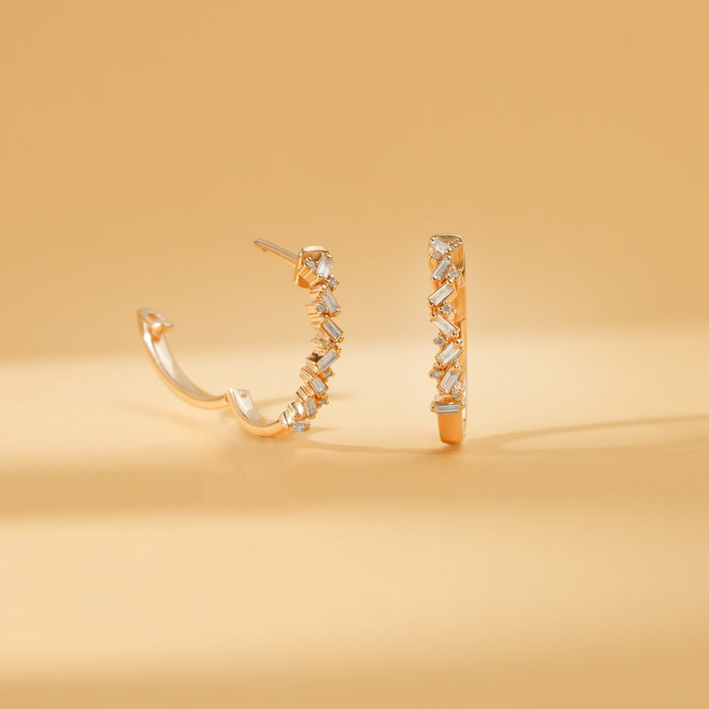 Pair of solid 14k gold stacked baguette diamond earring hoops 