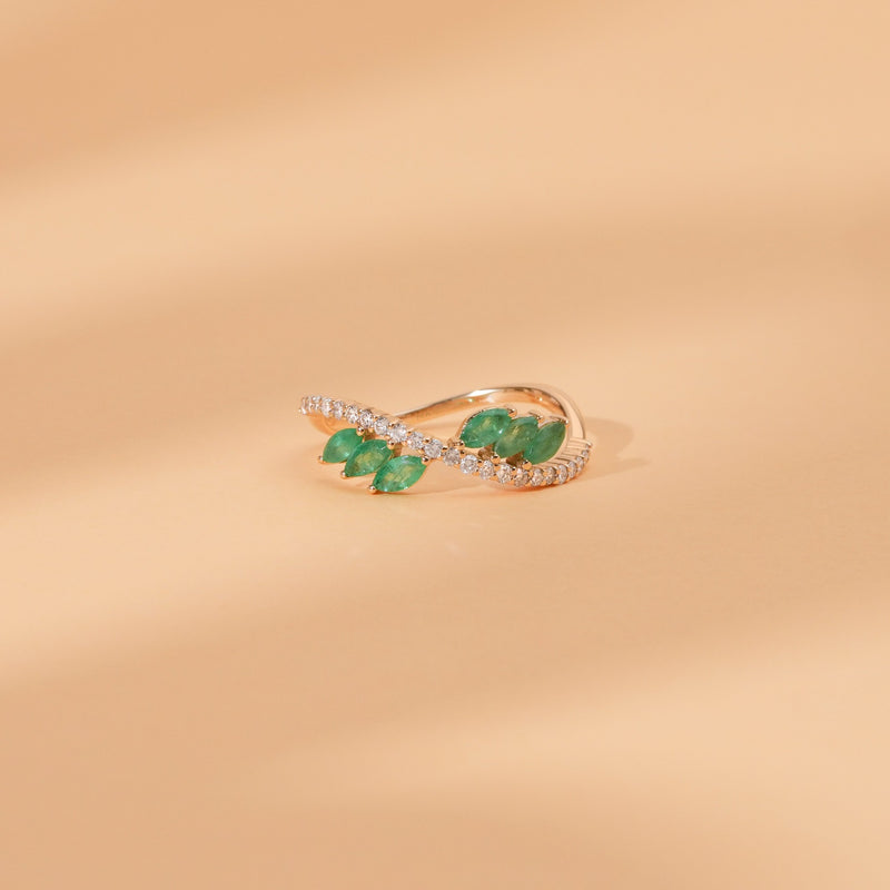 marquise emerald round diamond ring