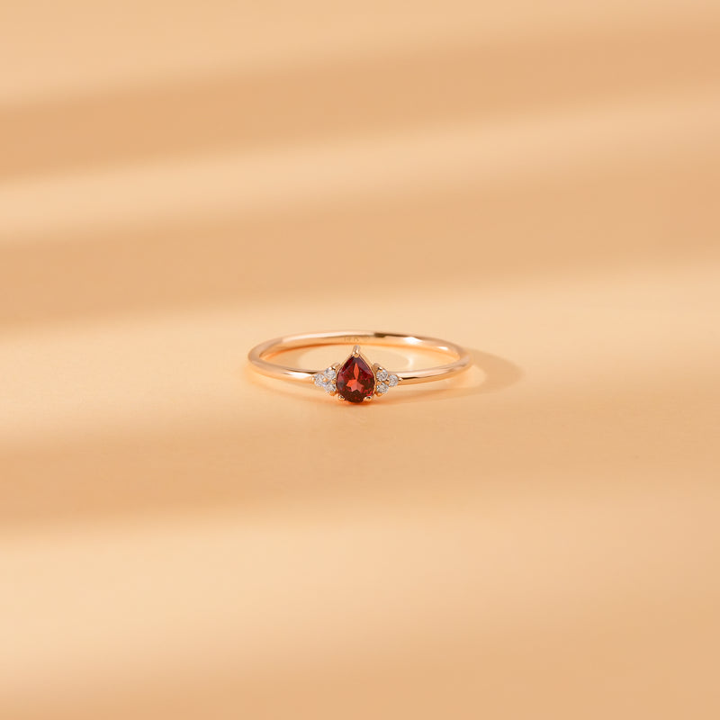 minimalistic style garnet engagement band
