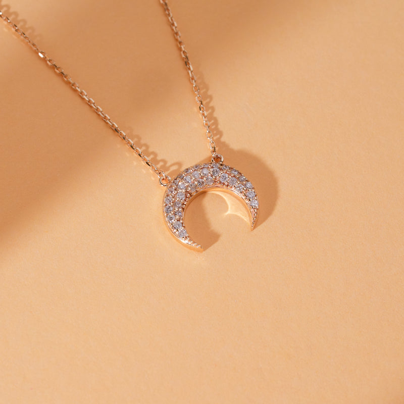 Gold diamond crescent necklace