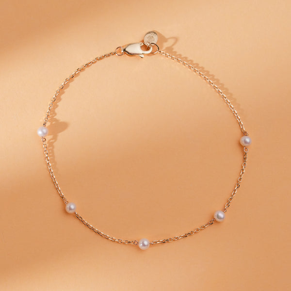 solid gold bracelet with natural pearls 