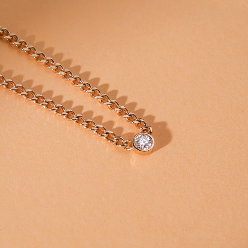 solid gold cuban chain necklace with single natural white diamond 
