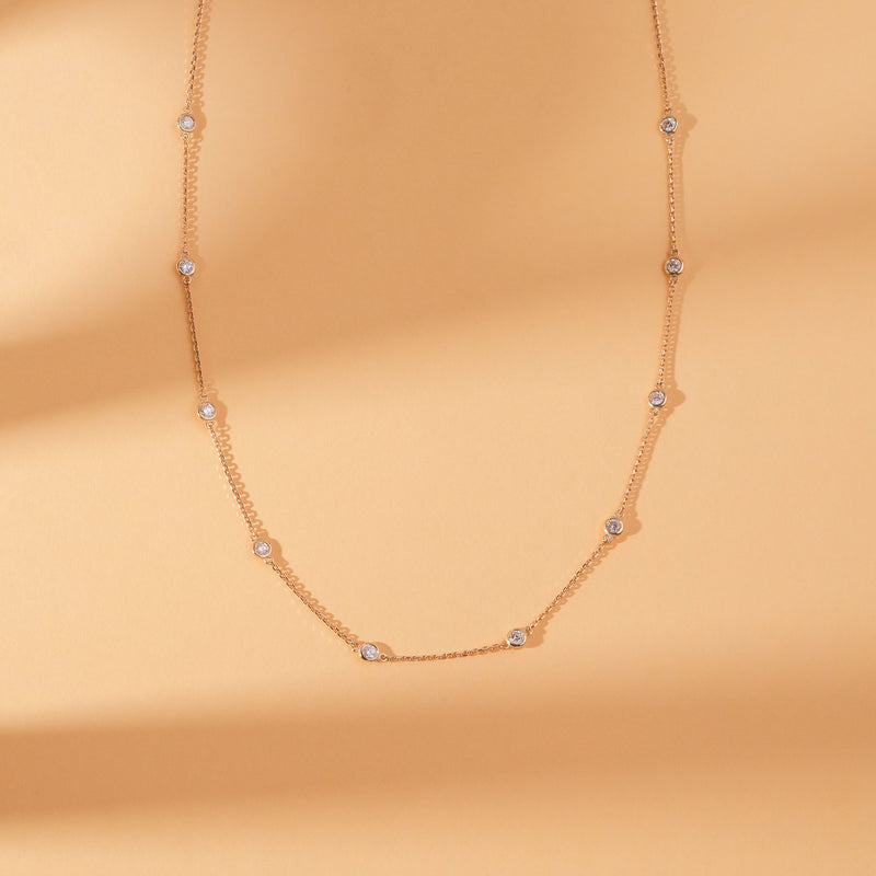 bezel set round cut clear diamonds