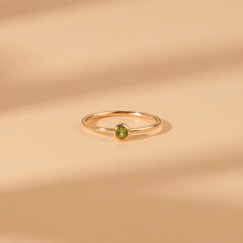 thin peridot august birthstone