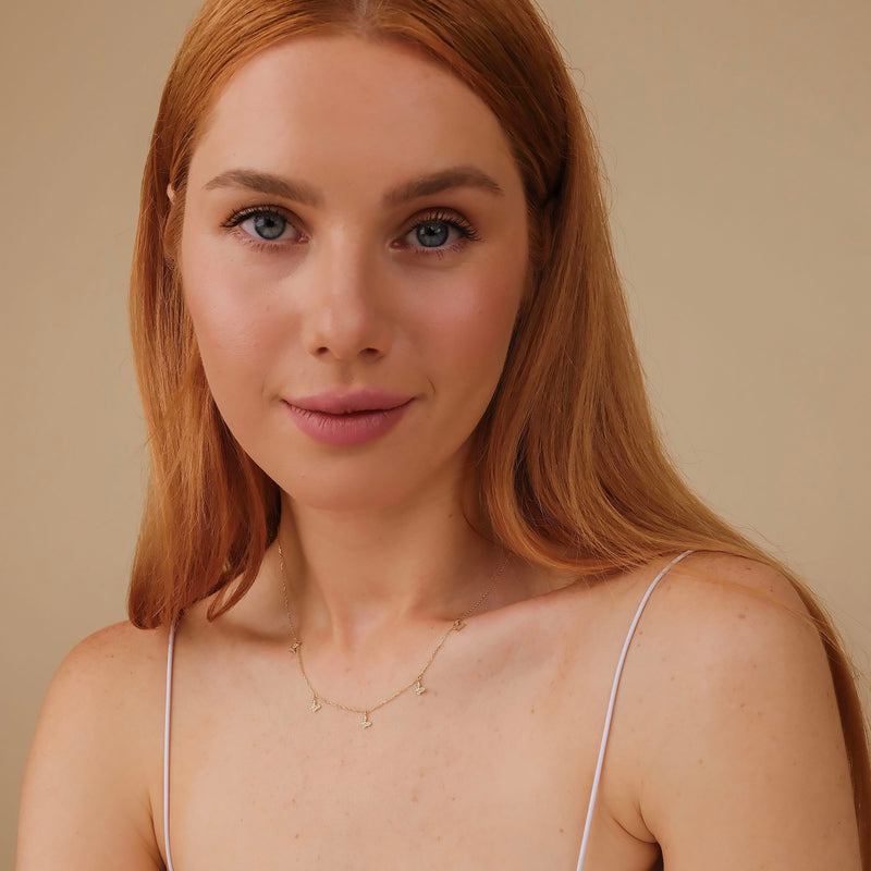 dainty layering necklace with mini butterflies in solid gold for her