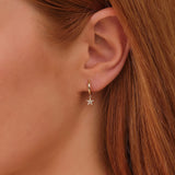 Model wears White Diamond Hoop Earrings with Petite Star Charm gift for her