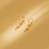 Pair of solid 14k gold hanging diamond huggies 