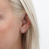Minimalist Flower Studs with natural marquise diamonds april birthstone