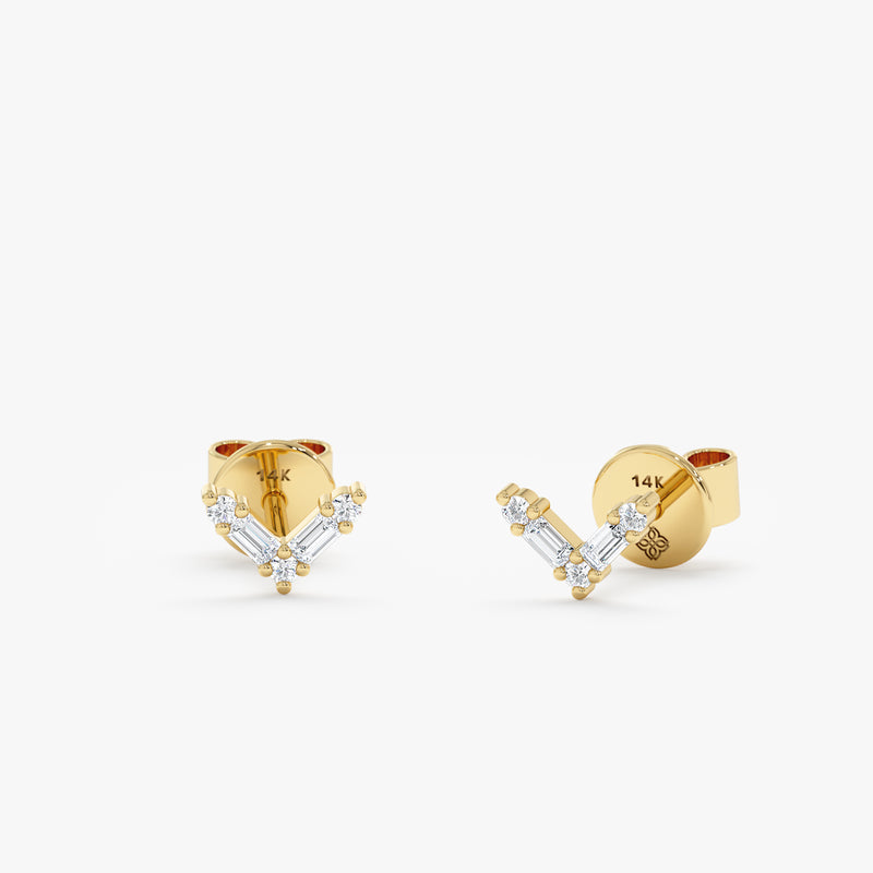 handcrafted pair of solid 14k gold chevron diamond lined stud earrings