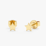 handmade pair of solid 14 gold star stud earrings
