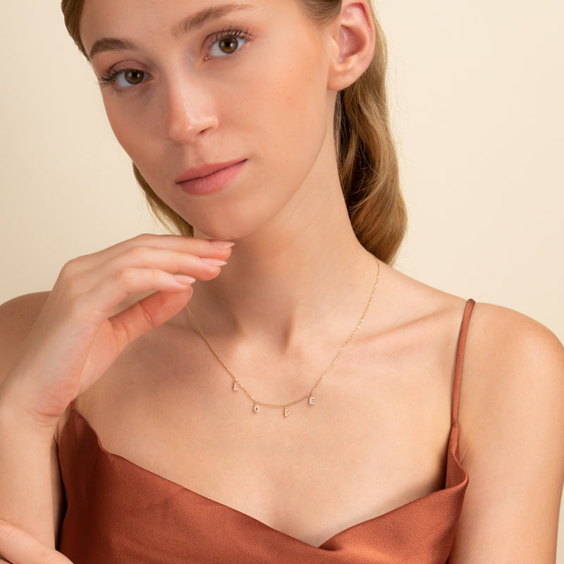 dainty love letters charm necklace with  natural diamonds in solid gold for her