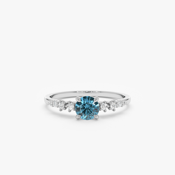 white gold engagement ring with london topaz and diamond