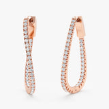 Pair of elegant twisted wavy hoop earrings lined with diamonds in 14k solid rose gold
