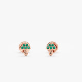 Pair of handmade mushroom stud earrings with emeralds in solid 14k rose gold.  