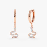 Pair of 14k solid rose gold snake charm huggie earrings 