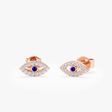 handmade pair of solid rose gold eye shape diamond lined with blue sapphire stud earrings