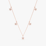 solid 14k rose gold necklace with hanging star charms with paved diamonds