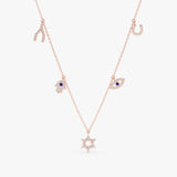 multiple protective charm necklace with lined diamonds and natural blue sapphire