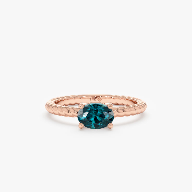 14k rose gold oval cut teal sapphire ring with twisted band
