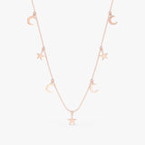 handcrafted solid 14k rose gold necklace with hanging moon and star charms