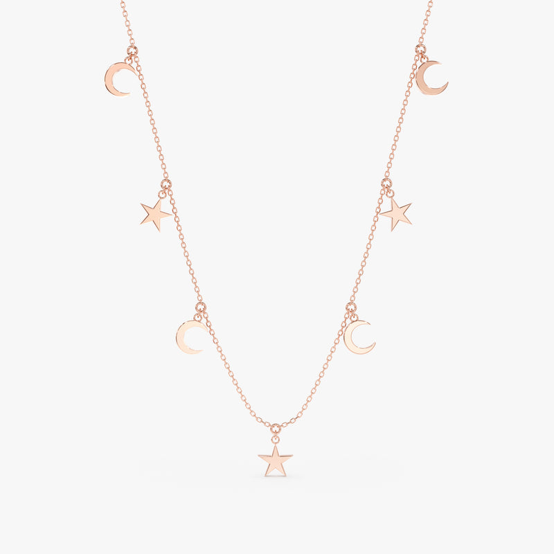 handcrafted solid 14k rose gold necklace with hanging moon and star charms