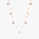 Gold, silver, or rose gold mixed coin drop necklace with diamonds.