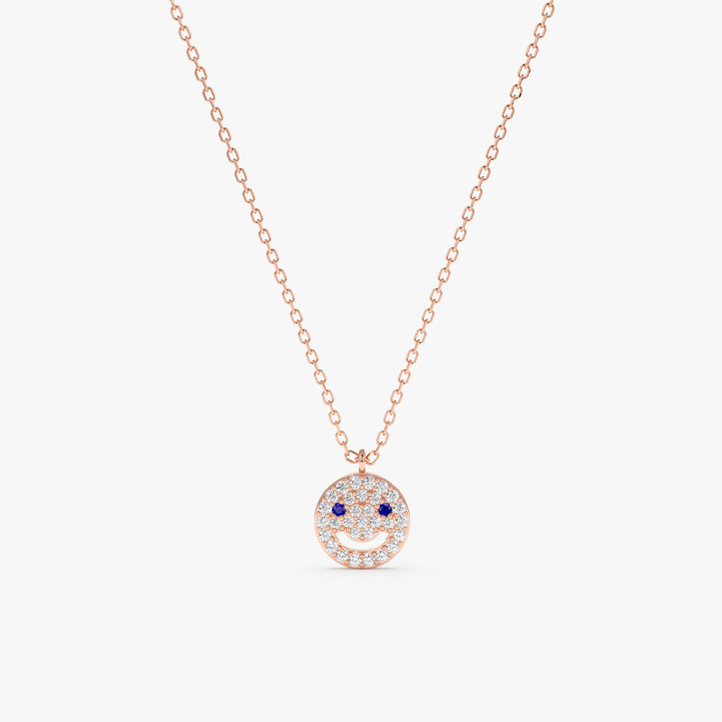 Happy face with diamond smile and blue sapphire eyes  – solid gold necklace.