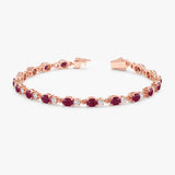 Luxurious 14k rose gold tennis bracelet with diamonds and rubies