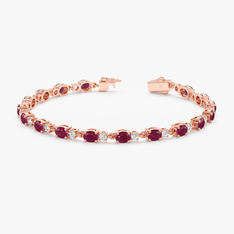 Luxurious 14k rose gold tennis bracelet with diamonds and rubies