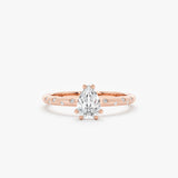 matte rose gold engagement ring with clear diamond