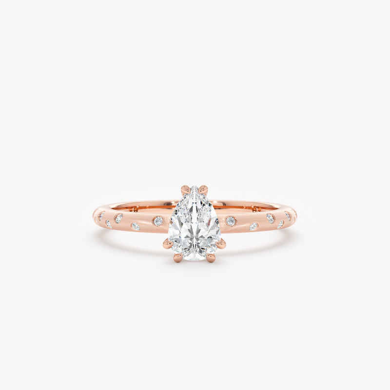 matte rose gold engagement ring with clear diamond