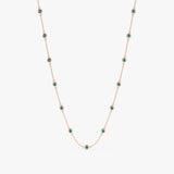 Gold emerald station necklace with multiple stones, available in yellow, rose, or white gold