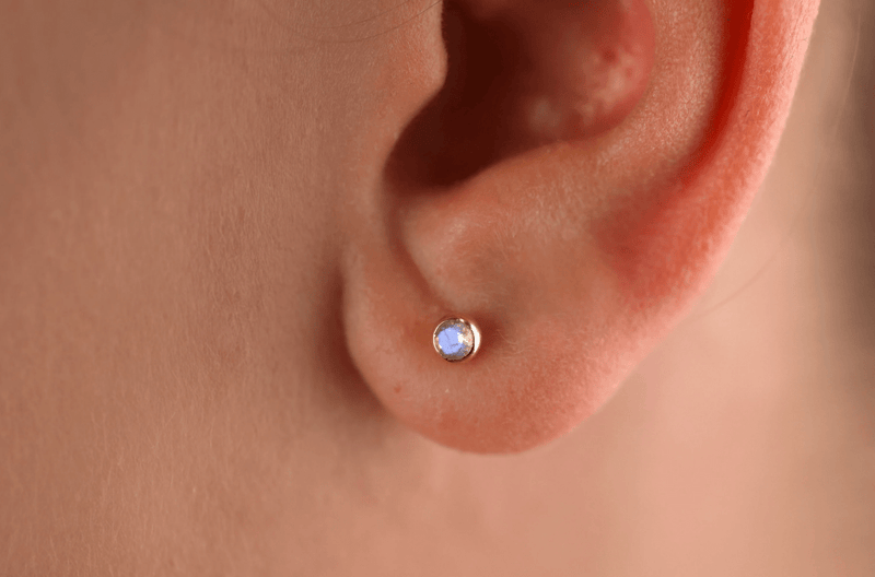 handcrafted in solid gold blue purple gem