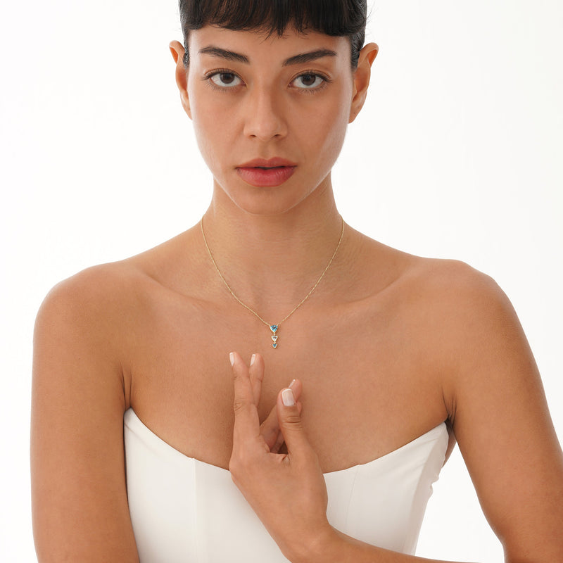 Trilliant Cut Blue Topaz Necklace, Vaelara