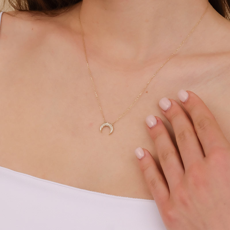 Diamond crescent horn necklace in gold