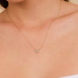 dainty solid gold necklace with multiple diamond octogen shape pendant